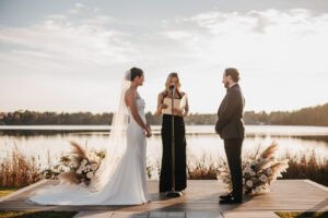 Bride and groom at their local lakeside wedding ceremony.