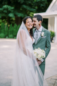 Bride and groom in courtyard at Saphire Estate