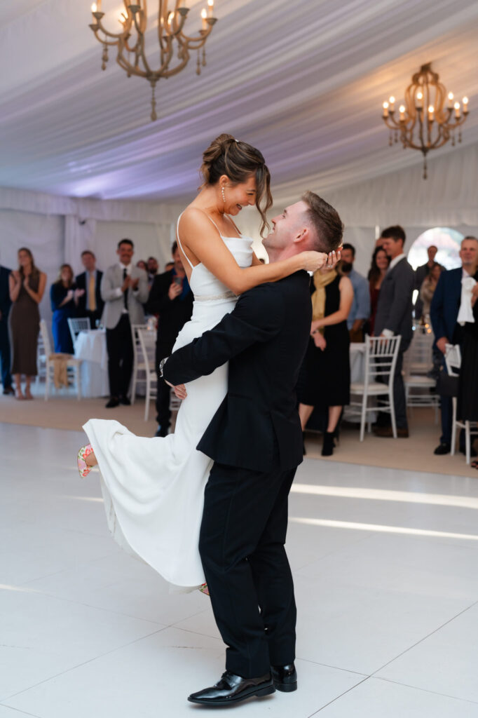 Bride and groom first dance lift