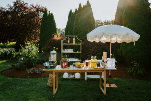 A cocktail spritz station set up in The Tent's garden area