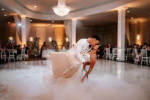 Bride and groom first dance at Avenir dancing in the clouds